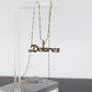 14k DELORES name pendant. DELORES 14k yellow gold pendant and necklace. st(81)