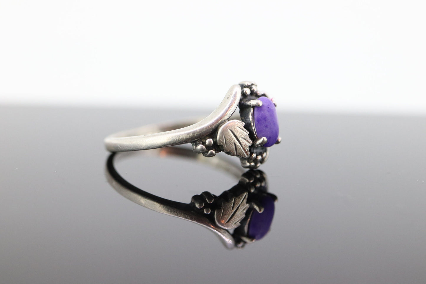 Black Hills Gold Sterling Silver Ring. Purple Sugilite cabochon with 10k inlays band. st(55)