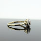 Diamond Daisy Cluster Elevated Ring. 10k Yellow gold with round diamond Cluster arrangement. st(47)
