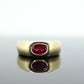 14k Ruby Ring. Bezel set Ruby ring. 14k yellow gold and oval Ruby bezel set. Wide ruby band. st(106)