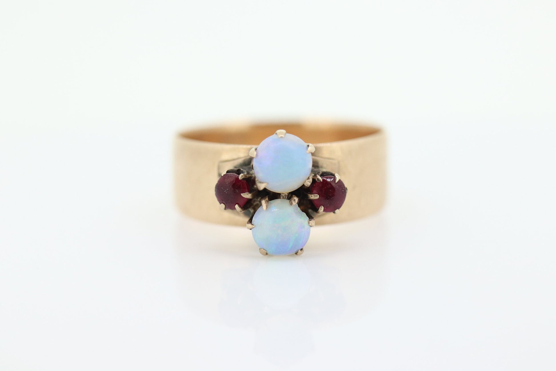 10k Victorian Opal and Garnet ring. 10k Gold Victorian claw opal ring. Wide Cigar BAnd. st(196)