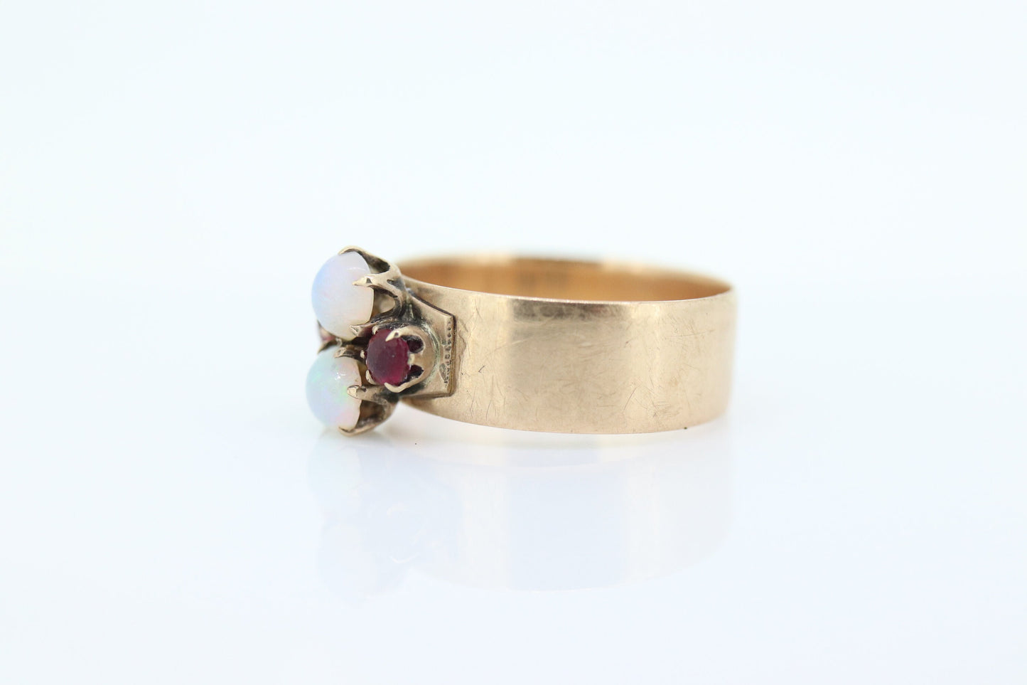 10k Victorian Opal and Garnet ring. 10k Gold Victorian claw opal ring. Wide Cigar BAnd. st(196)