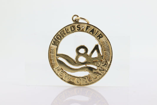 14k World FAIR 1984 New Orleans Medallion Pendant. 1984 New Orleans World Fair Commemorative Pendant. sst(90)