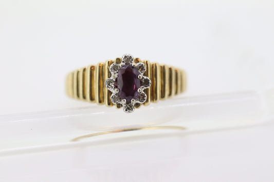 10k Ruby and Diamond HALO ring. 10k Yellow Gold Ribbed shank Ruby Halo ring. st(92)