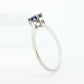 Platinum Sapphire and diamond ring. Oval blue Sapphire solitaire with Diamond accents trilogy ring.
