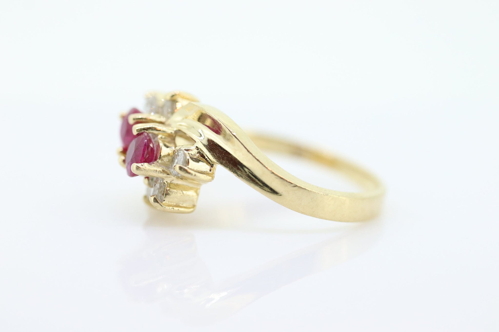 14k Ruby and Diamond Halo Ring. 14k Daisy Twin Double Ruby and Diamond Bypass ring.