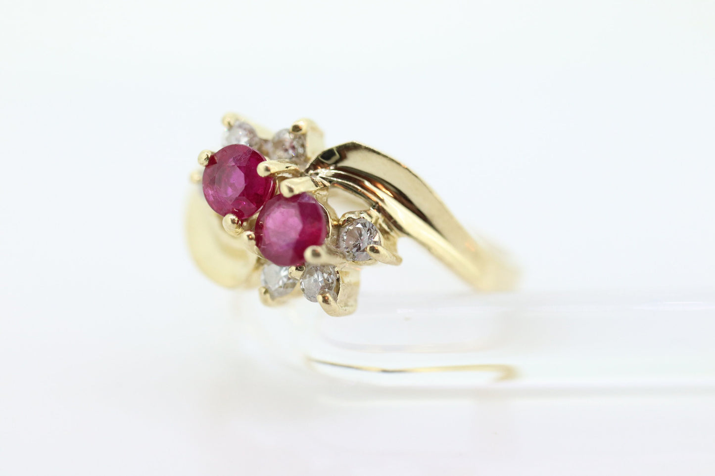 14k Ruby and Diamond Halo Ring. 14k Daisy Twin Double Ruby and Diamond Bypass ring.