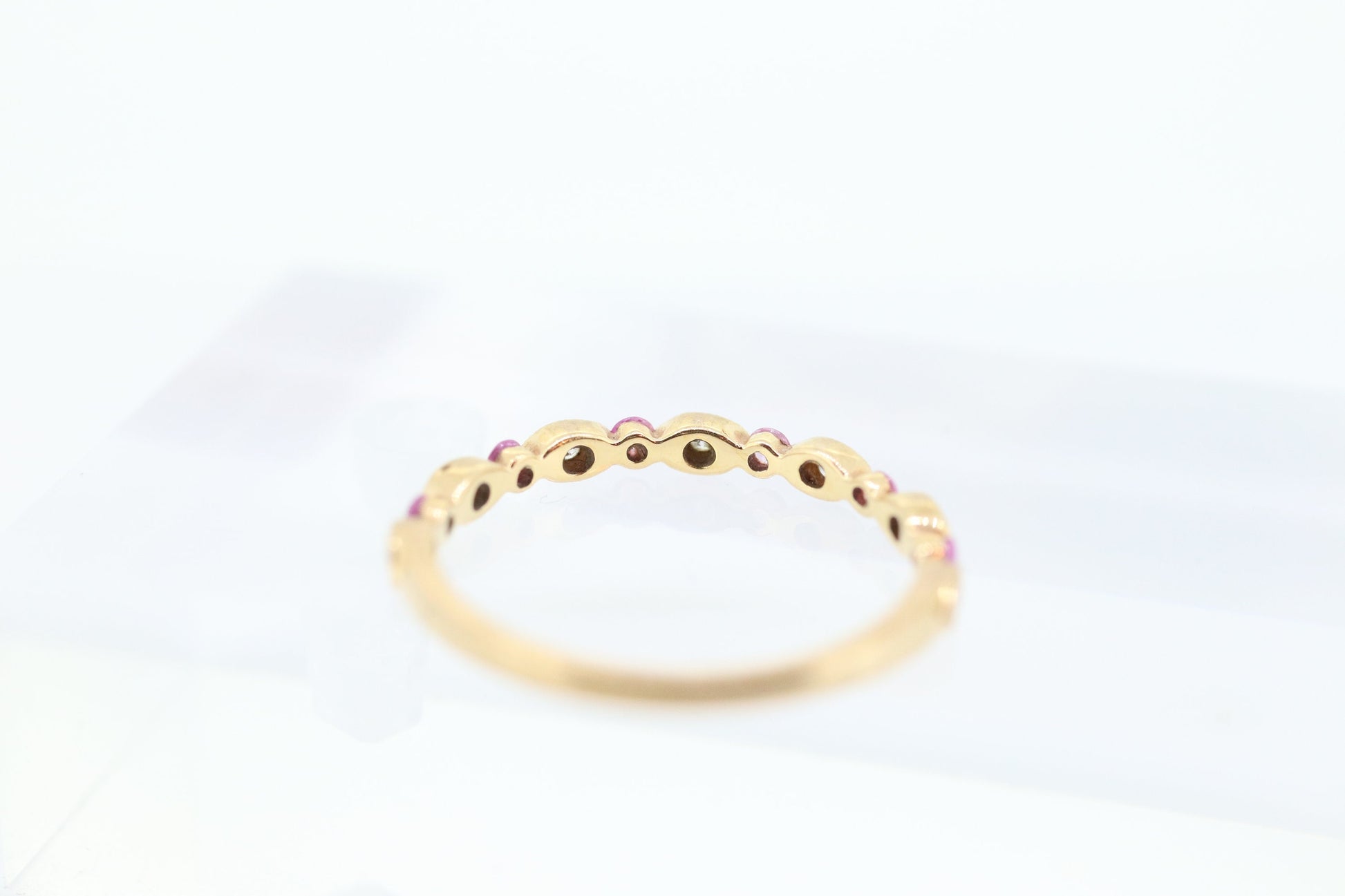 DAUSSI 18k Anniversary Ruby Diamond Ring. Henri Daussi 18k gold ring with round Ruby and diamond accents eternity band. st(253)