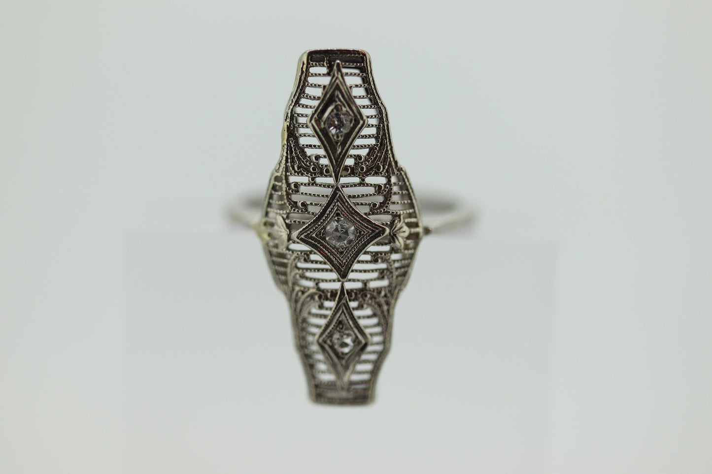 10k Filigree three diamond shield ring. 10k Art Deco trio triple diamond shield ring. st(138)