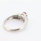 Oval Pink Sapphire Solitaire. 14k white gold with diamond melees st195