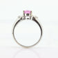 Oval Pink Sapphire Solitaire. 14k white gold with diamond melees st195