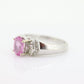 Oval Pink Sapphire Solitaire. 14k white gold with diamond melees st195