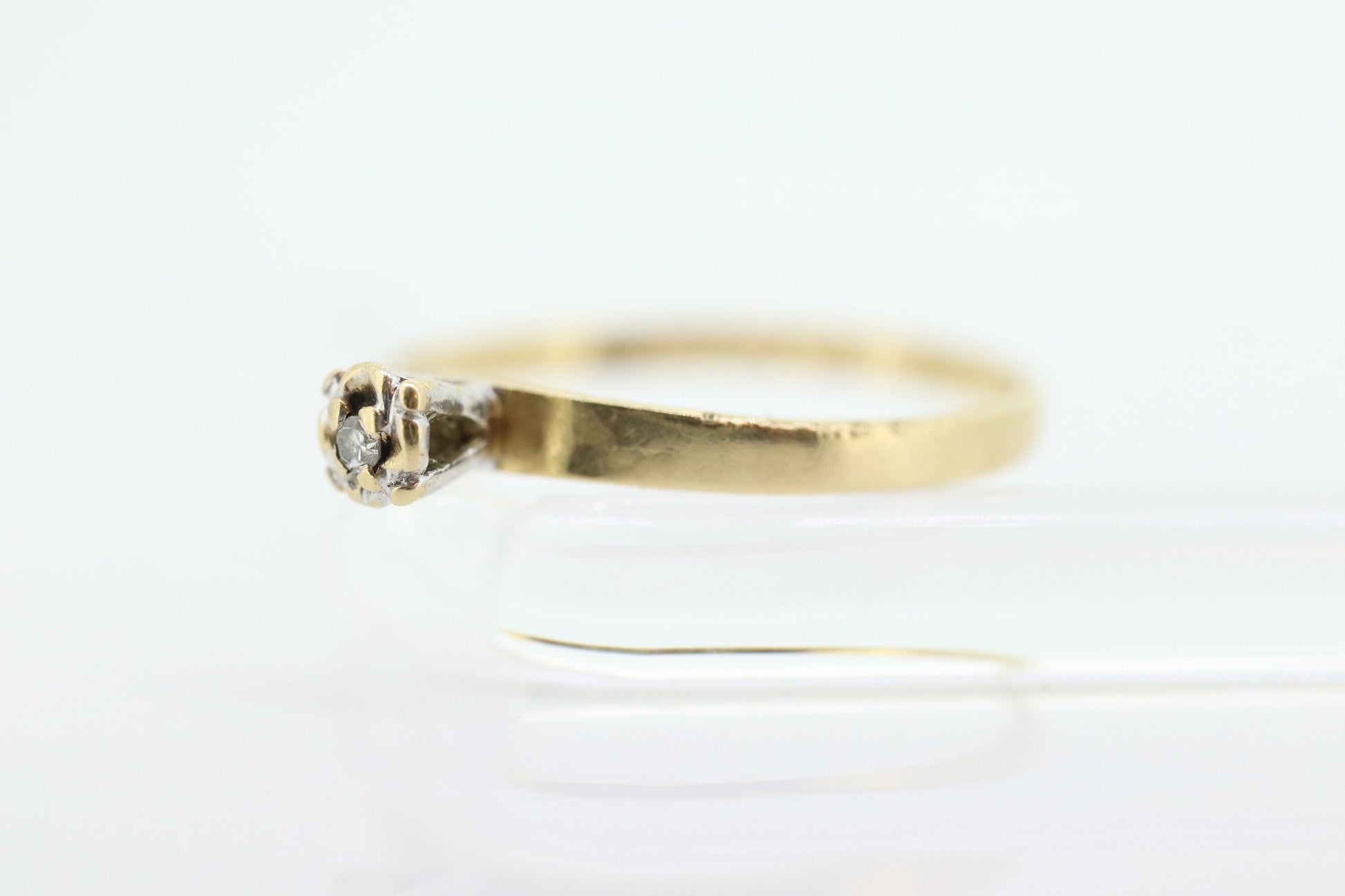 14k Diamond Solitaire. 14k Yellow gold engraved illusion set Daisy diamond ring.