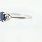 Platinum Sapphire and diamond ring. Oval blue Sapphire solitaire with Diamond accents trilogy ring.