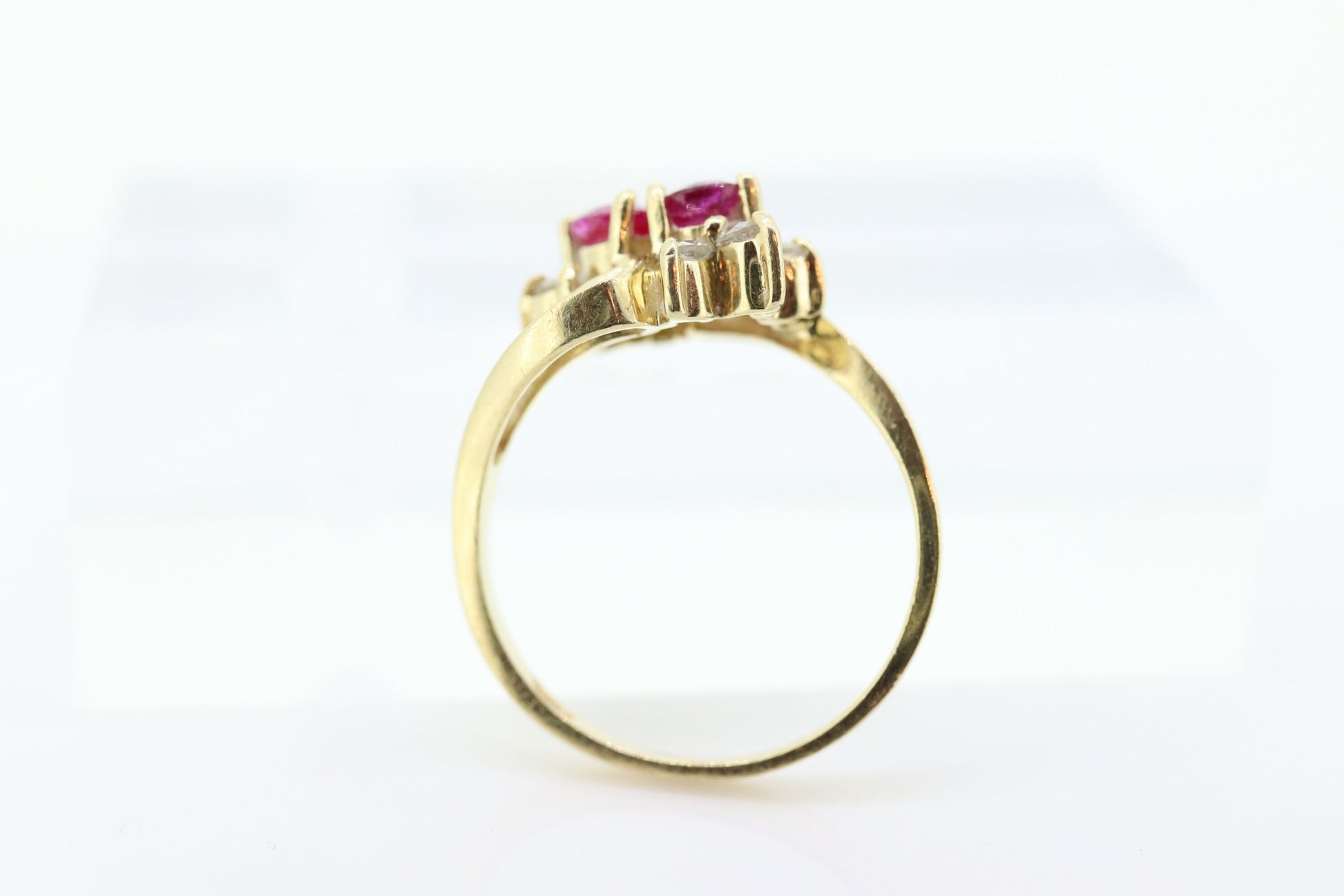 14k Ruby and Diamond Halo Ring. 14k Daisy Twin Double Ruby and Diamond Bypass ring.