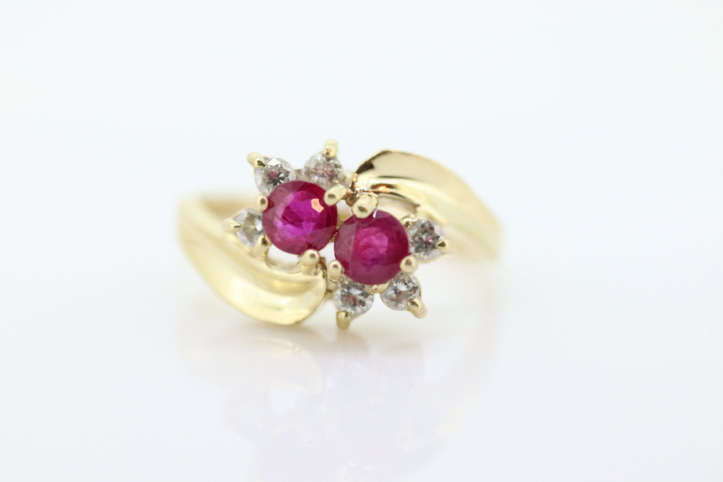 14k Ruby and Diamond Halo Ring. 14k Daisy Twin Double Ruby and Diamond Bypass ring.