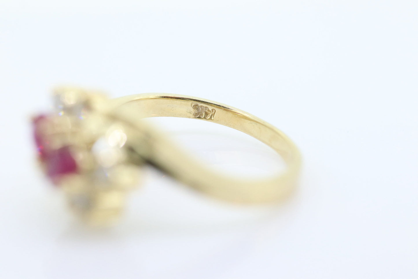 14k Ruby and Diamond Halo Ring. 14k Daisy Twin Double Ruby and Diamond Bypass ring.