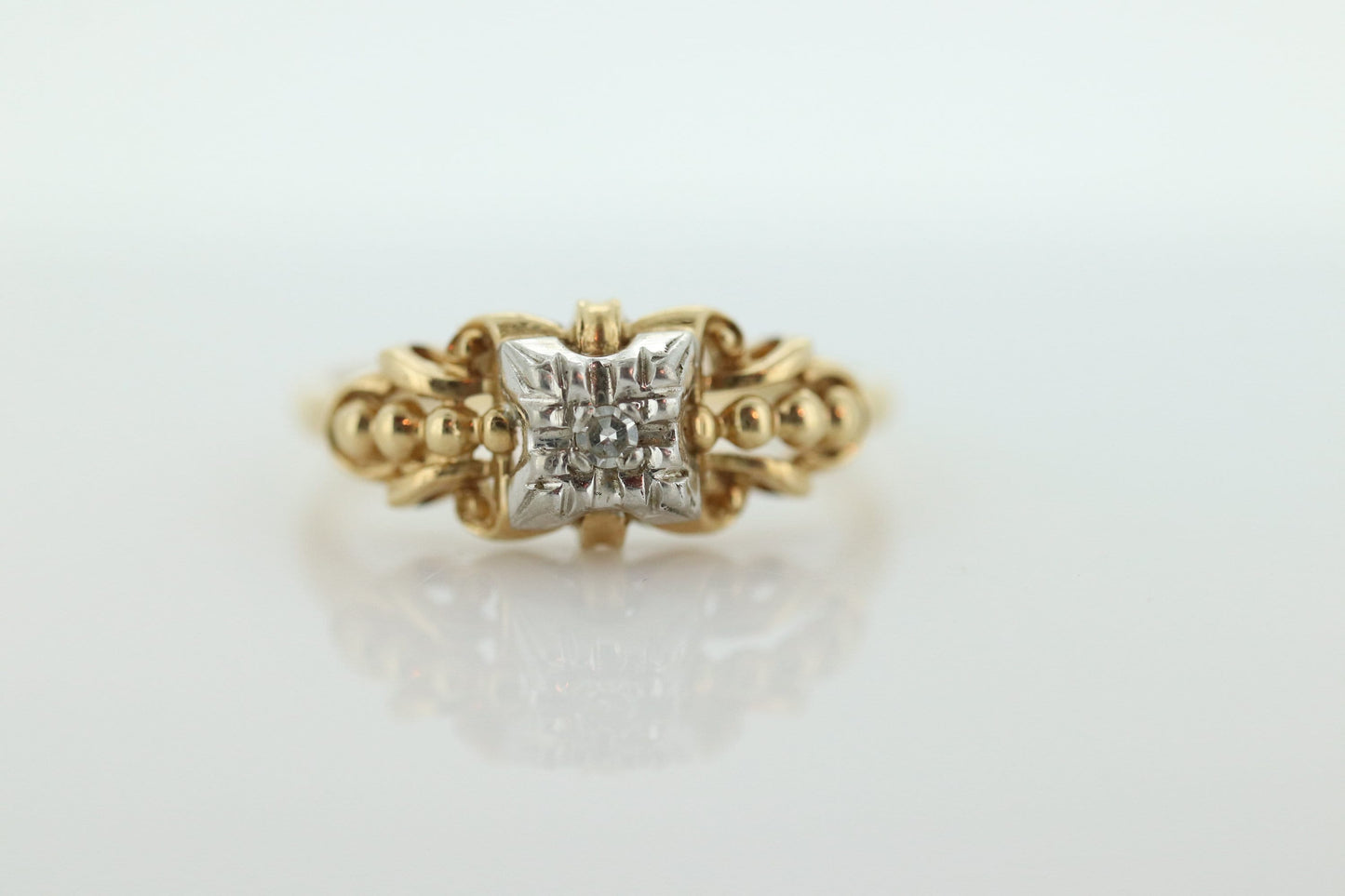 Art Deco Diamond ring. 14k Yellow and White Gold Square table. st(80/84)