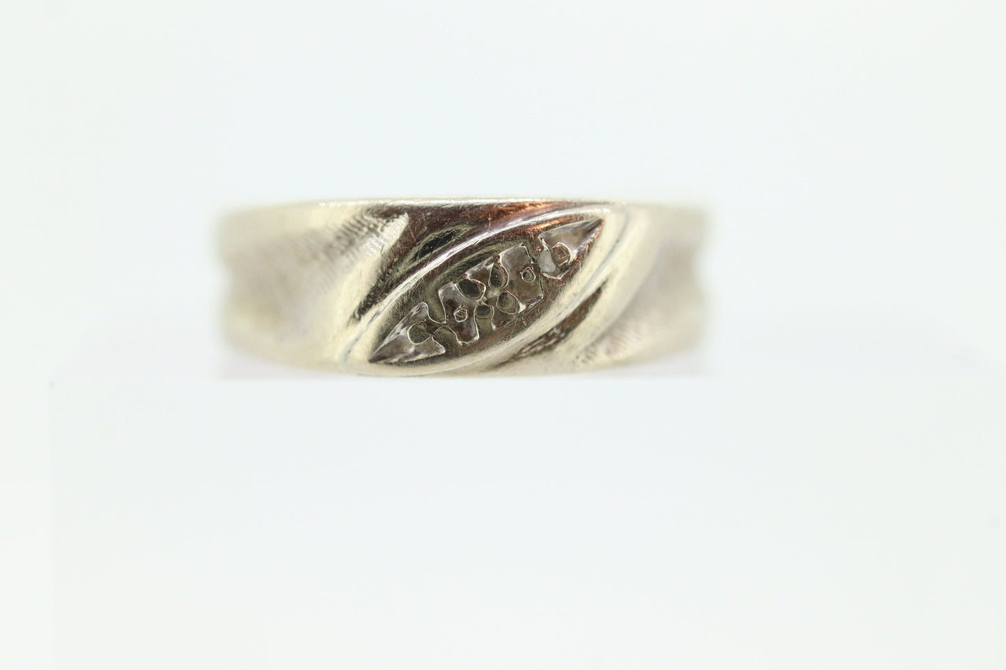 Textured 10k White Gold Band. 10k Engraved and Textured Wedding ring with tiny diamond melees. st(63/25)