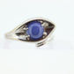 Linde Blue STAR Sapphire Solitaire  ring. 10k White gold sapphire solitaire. Blue Star Sapphire bypass ring. st(97/75