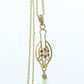 Otsby Barton Diamond pendant lavaliere. 10k Gold with a diamond set buttercup with rice pearl pendant for necklace. Otsby Barton (st80)