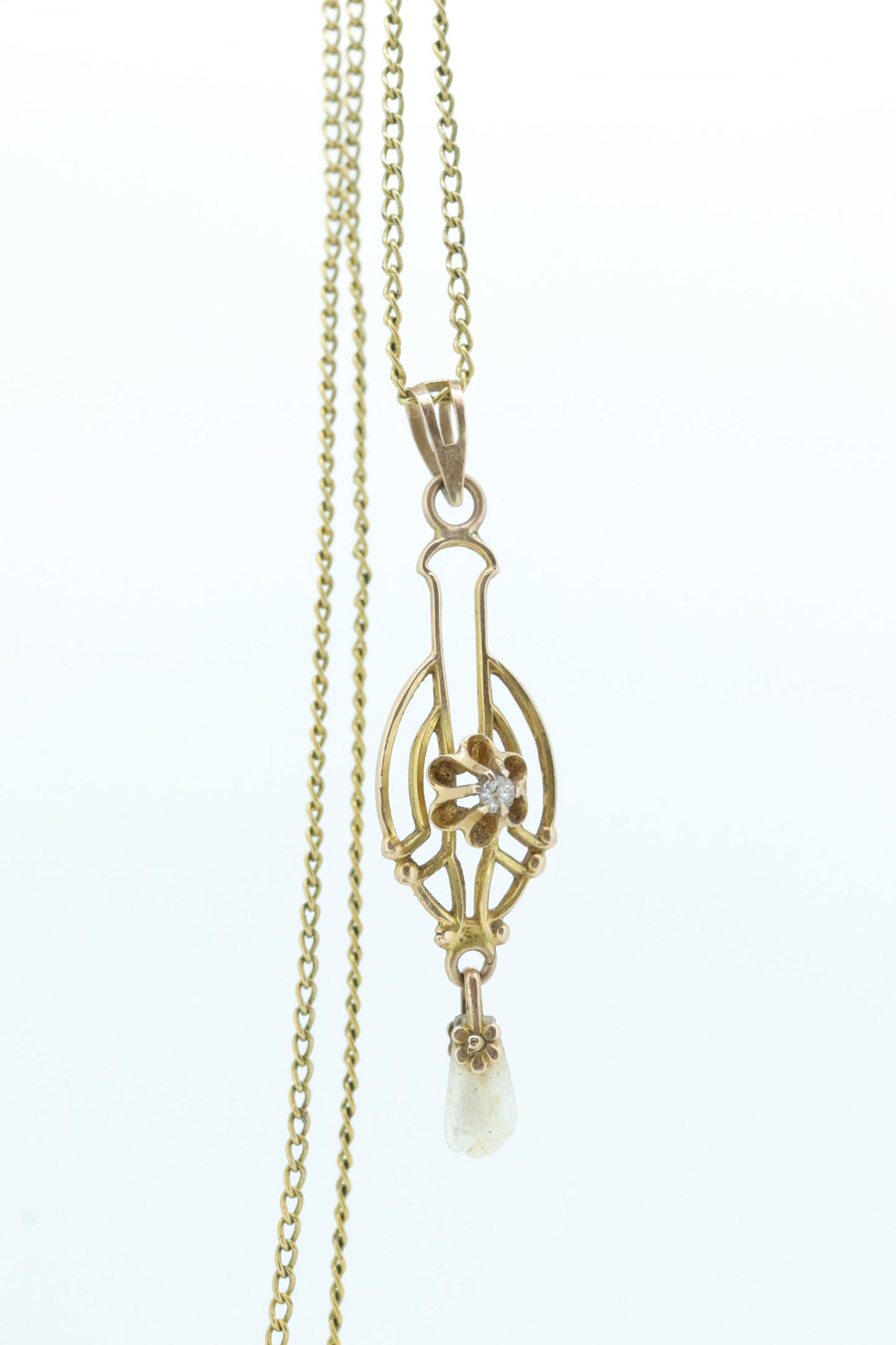 Otsby Barton Diamond pendant lavaliere. 10k Gold with a diamond set buttercup with rice pearl pendant for necklace. Otsby Barton (st80)