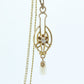 Otsby Barton Diamond pendant lavaliere. 10k Gold with a diamond set buttercup with rice pearl pendant for necklace. Otsby Barton (st80)