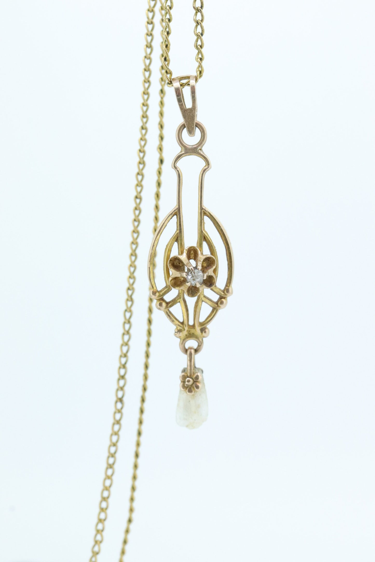 Otsby Barton Diamond pendant lavaliere. 10k Gold with a diamond set buttercup with rice pearl pendant for necklace. Otsby Barton (st80)