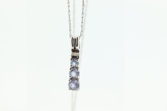 10k Tanzanite and diamond Journey Pendant. Past present future necklace