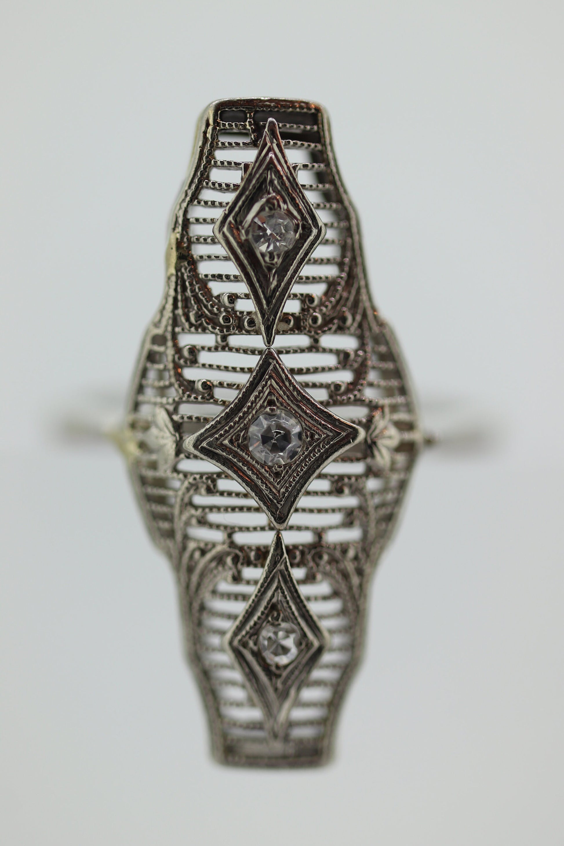 10k Filigree three diamond shield ring. 10k Art Deco trio triple diamond shield ring. st(138)