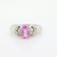 Oval Pink Sapphire Solitaire. 14k white gold with diamond melees st195