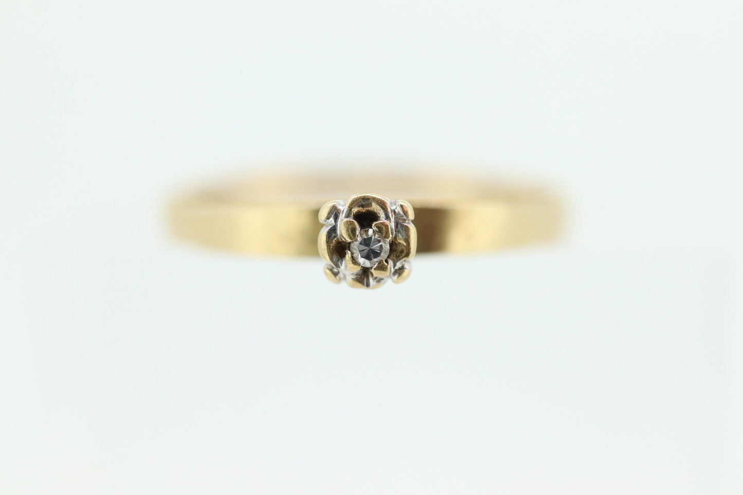 14k Diamond Solitaire. 14k Yellow gold engraved illusion set Daisy diamond ring.