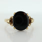 10k ONYX ring. Oval Onyx prong set victorian mourning ring. Scroll work shoulders. (st32/20)