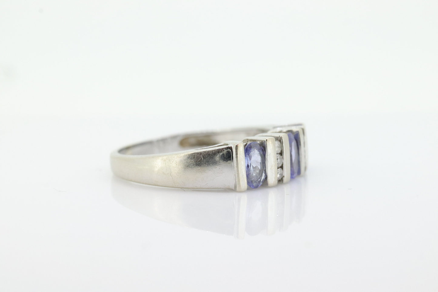 14k Tanzanite Oval and Diamond Channel Anniversary ring. Channel set eternity band. Tanzanite diamond. st(98)