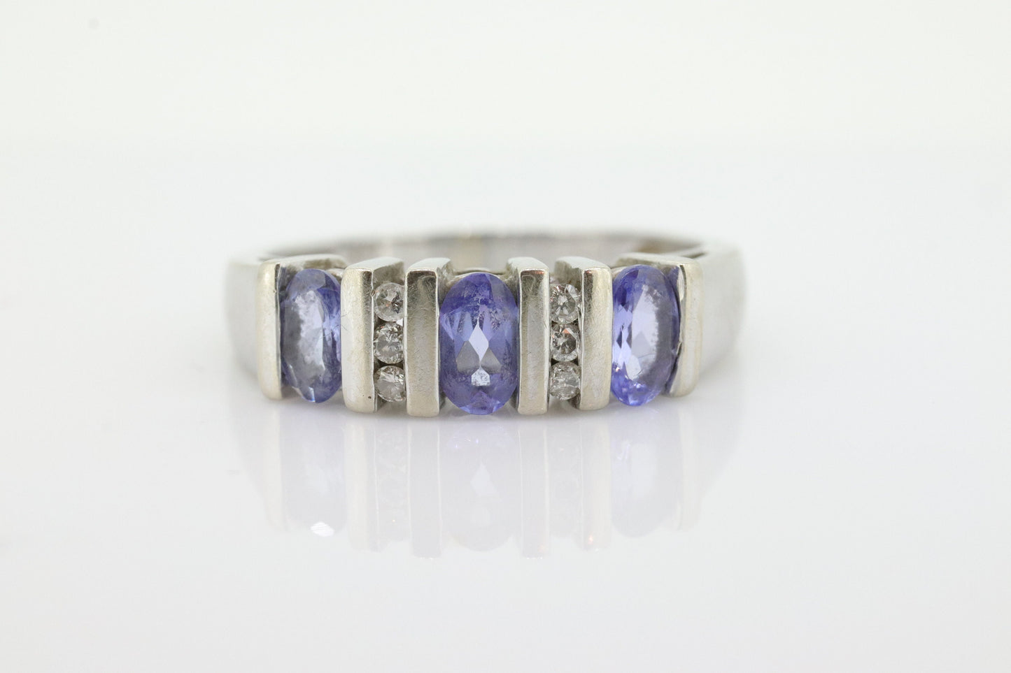 14k Tanzanite Oval and Diamond Channel Anniversary ring. Channel set eternity band. Tanzanite diamond. st(98)