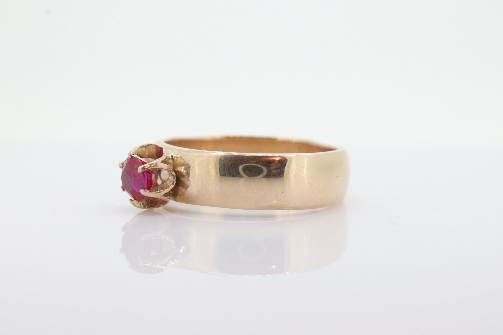 Vintage Buttercup Ruby Ring. 10k gold ring with a solitaire round Ruby. WiDe shank band. Buttercup Claw ruby. st(92)