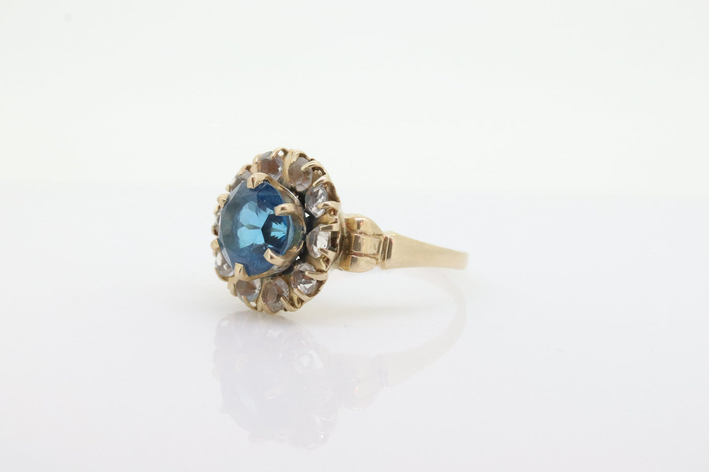 10k Blue Topaz and White Topaz Halo ring. 10k Aquamarine Halo solitaire. st(80)