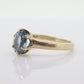 10k Topaz Solitaire Ring. 10k yellow gold HANDWROUGHT Blue Oval Topaz solitaire ring. st(42)