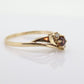 10k Garnet and diamond ring. 10k Round cut garnet with diamonds solitaire. st(62)
