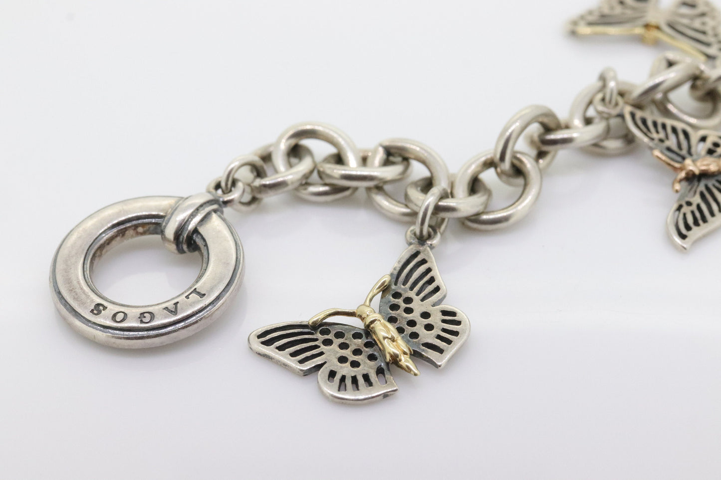 LAGOS Caviar Butterfly Bracelet. Sterling Silver 18K Yellow Gold Butterfly Charm Dangling Heavy Bracelet. (st161)