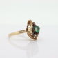 14k round Emerald and diamond ring. 14k Yellow gold marquise shape with diamond accents. st(55)