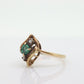 14k round Emerald and diamond ring. 14k Yellow gold marquise shape with diamond accents. st(55)