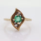 14k round Emerald and diamond ring. 14k Yellow gold marquise shape with diamond accents. st(55)