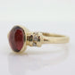 10k Red Tourmaline Ring. Bezel set OVAL Cabochon Tourmaline solitaire and diamond ring. st(92)