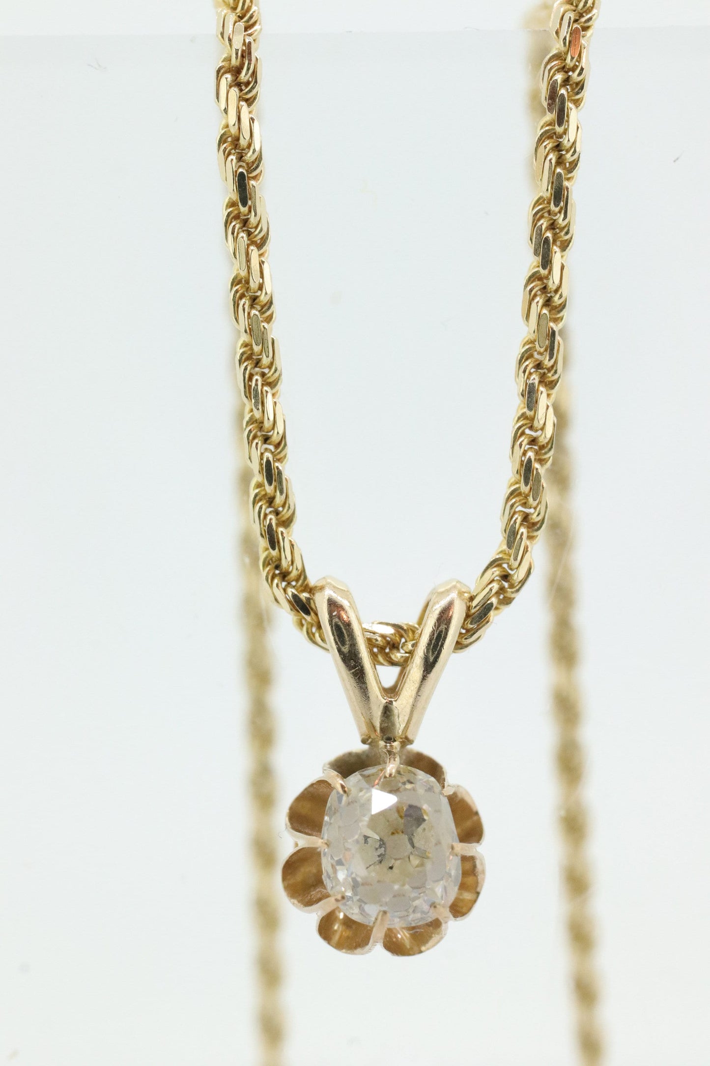 Antique Diamond solitaire pendant Buttercup setting. 14k Gold with a old mine diamond set buttercup. Art nouveau era. st(207)
