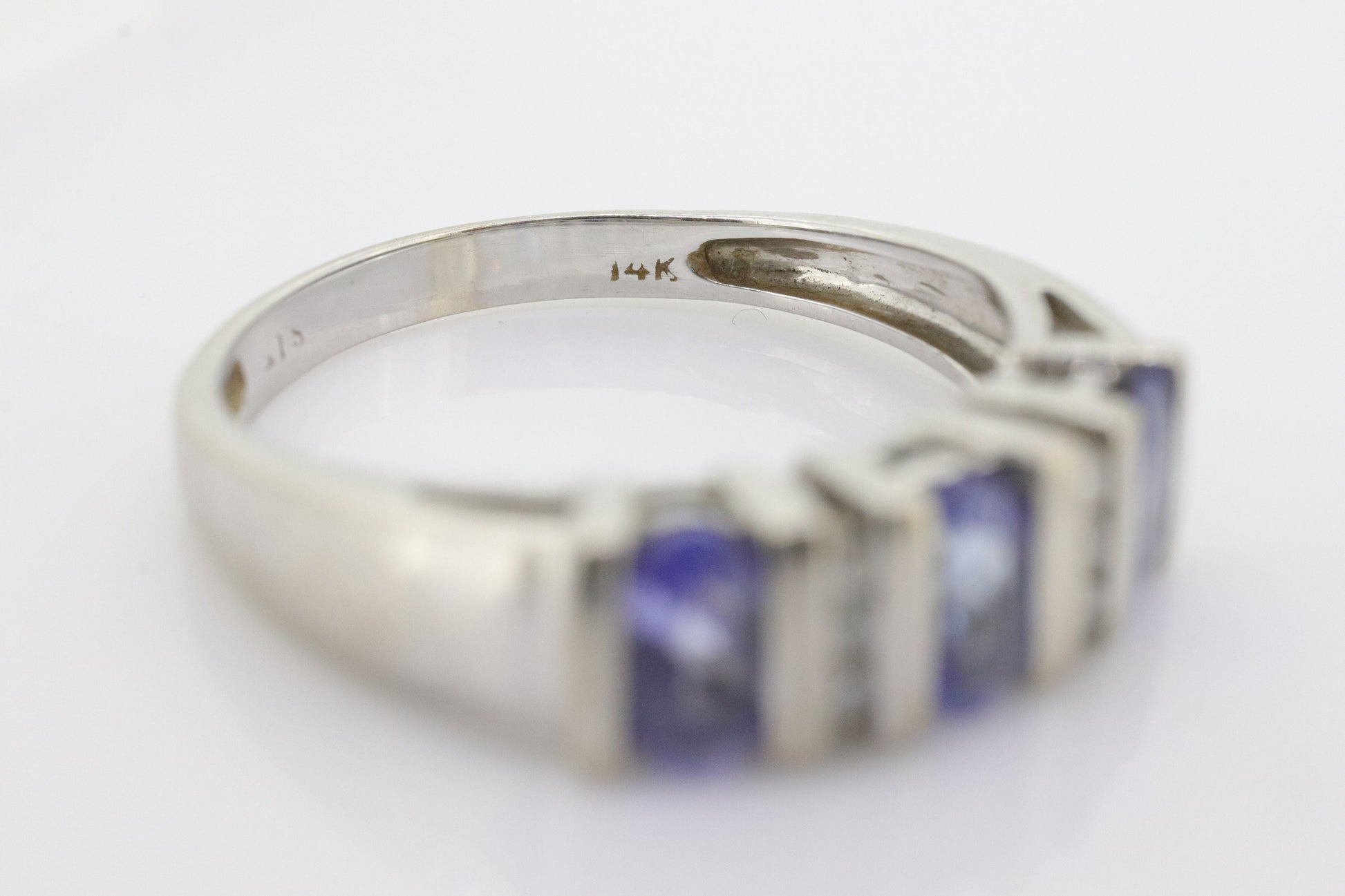 14k Tanzanite Oval and Diamond Channel Anniversary ring. Channel set eternity band. Tanzanite diamond. st(98)