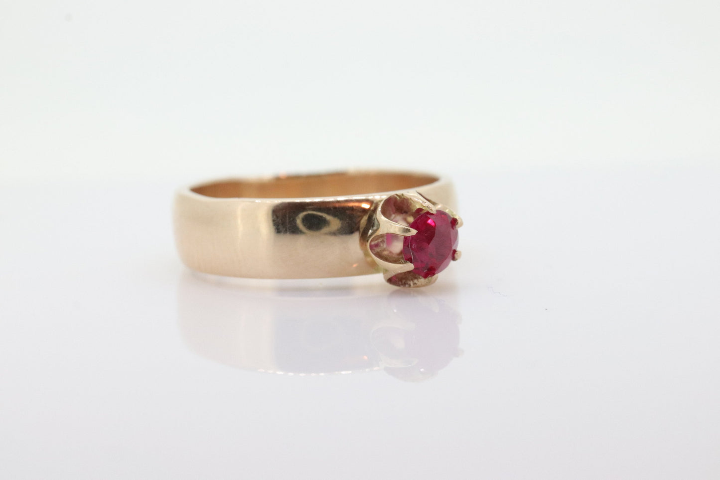 Vintage Buttercup Ruby Ring. 10k gold ring with a solitaire round Ruby. WiDe shank band. Buttercup Claw ruby. st(92)