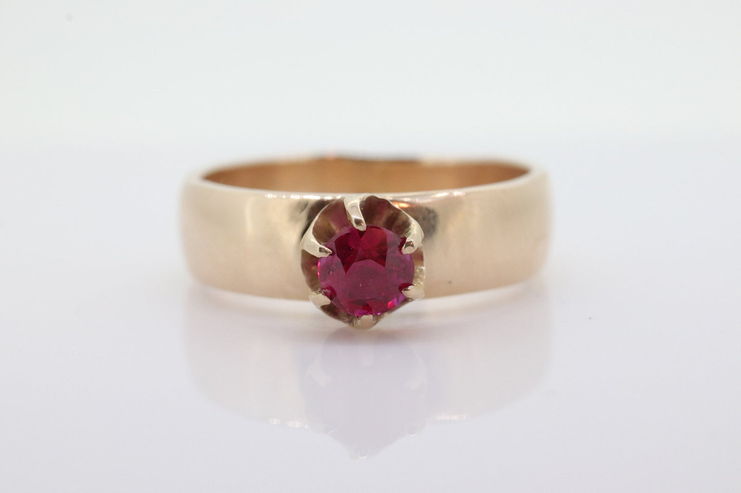 Vintage Buttercup Ruby Ring. 10k gold ring with a solitaire round Ruby. WiDe shank band. Buttercup Claw ruby. st(92)