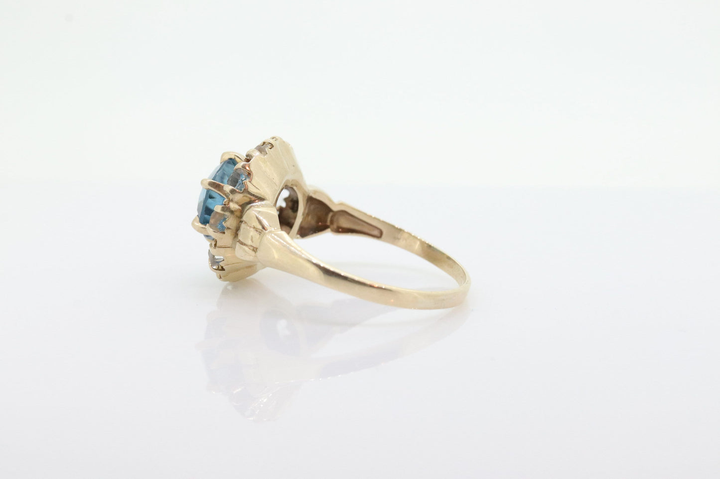 10k Blue Topaz and White Topaz Halo ring. 10k Aquamarine Halo solitaire. st(80)