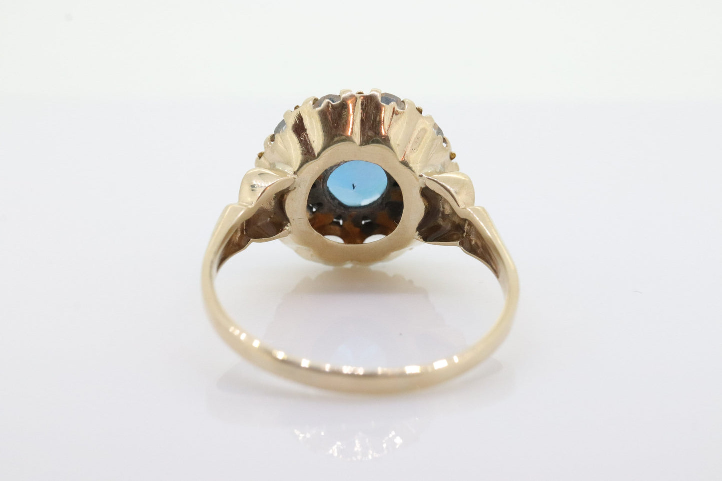 10k Blue Topaz and White Topaz Halo ring. 10k Aquamarine Halo solitaire. st(80)